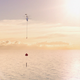 During tests, the recovery helicopter succeeded in catching the booster and delivering it to an awaiting ship.